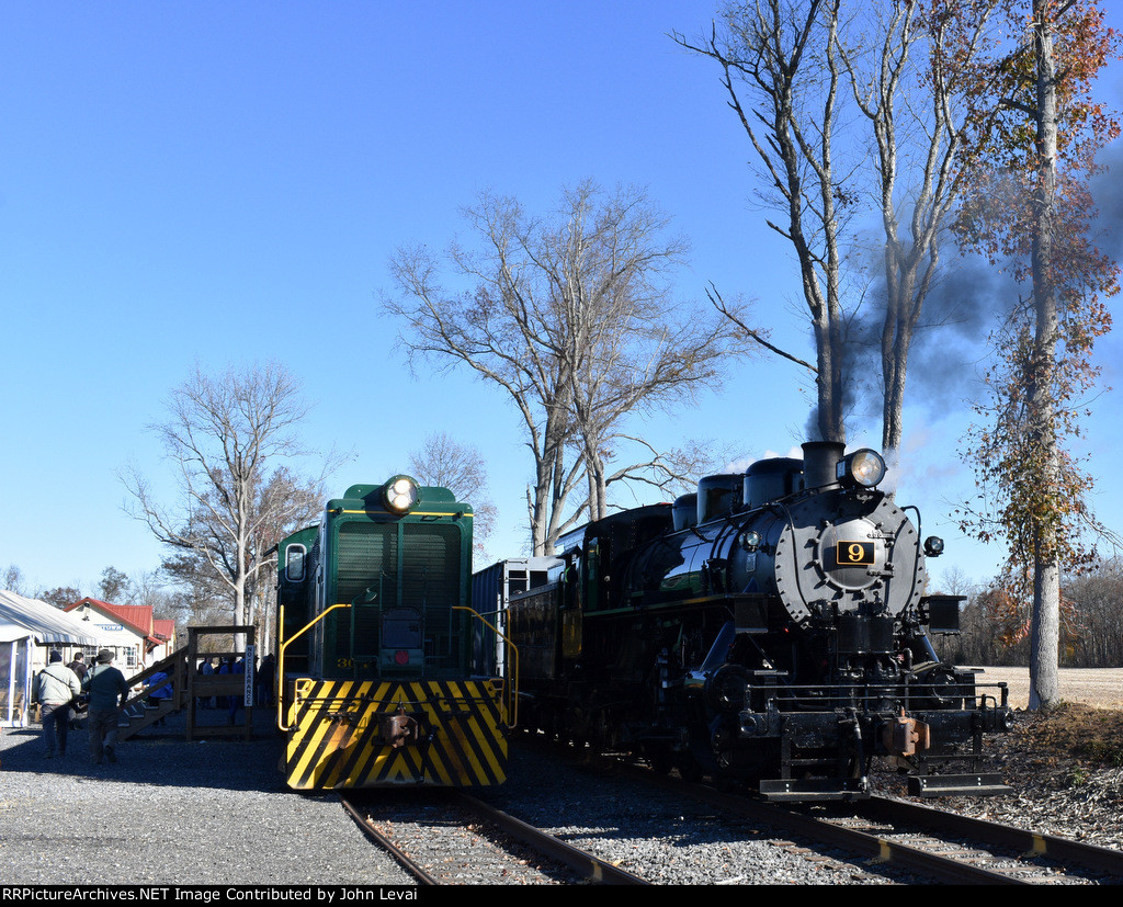 Diesel passenger photo charter on the left and the freight photo special sits on the right at the South Woodstown Station 